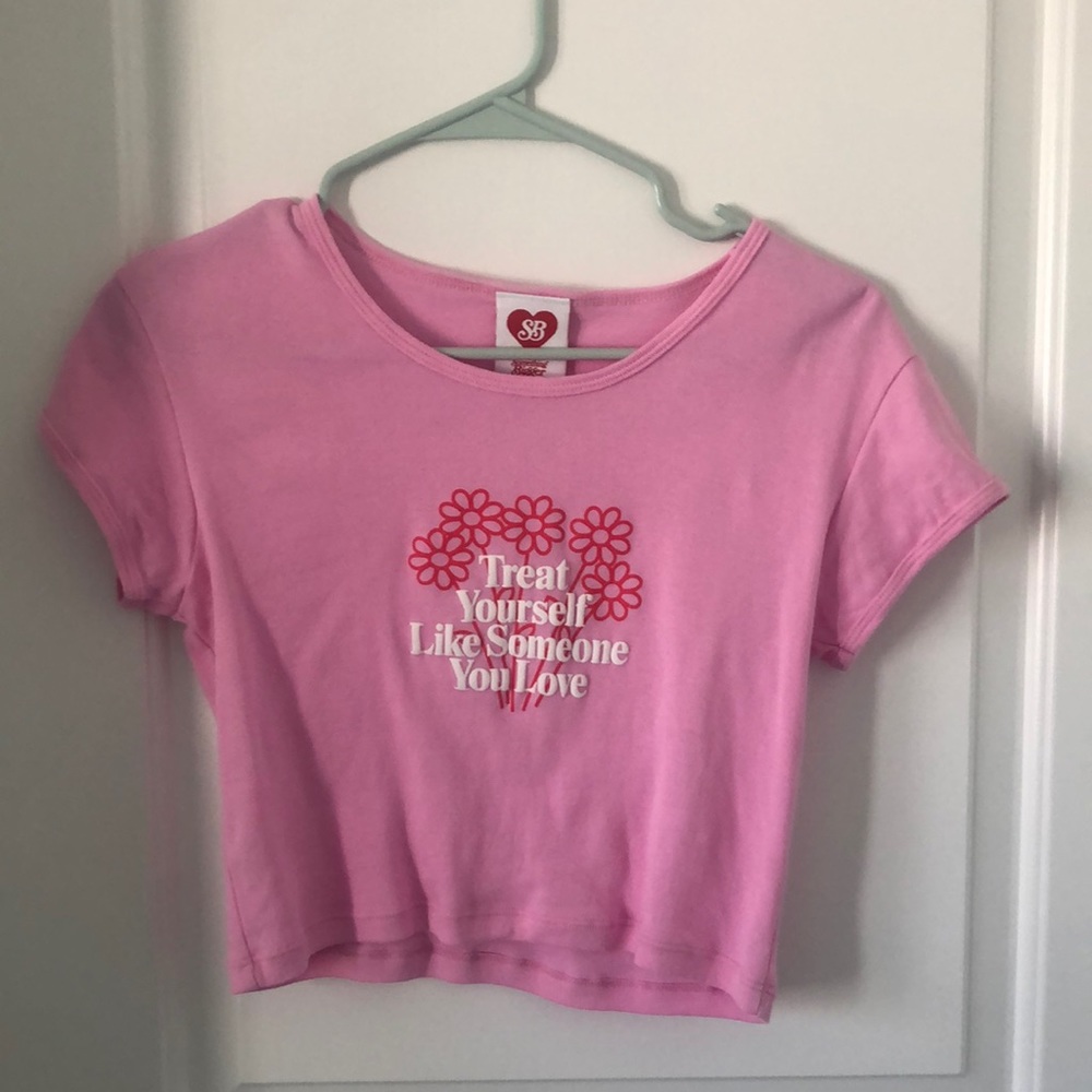 Pink crop top from the Tik Toker, Spencer Barbosa’s, website Something bigger.